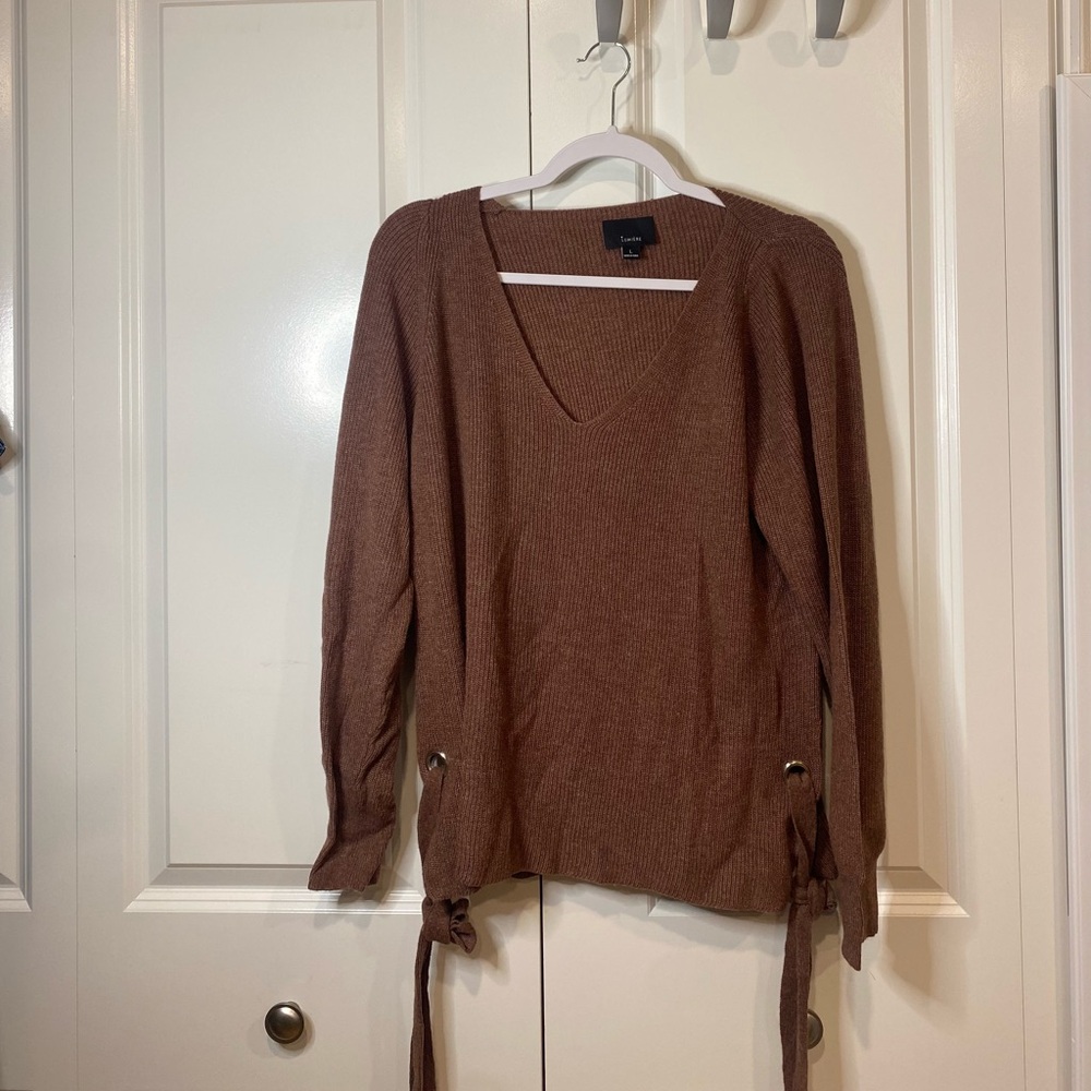 Large sweater ties on both sides